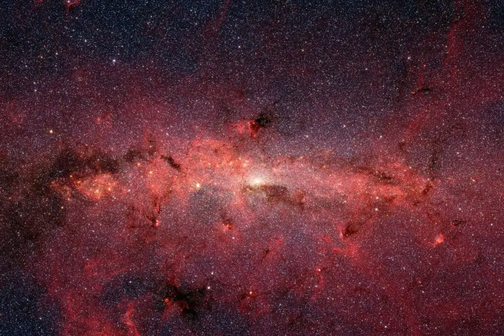 Le cœur (centre galactique) de la Voie lactée vu en infrarouge par le télescope spatial Spitzer de la NASA.